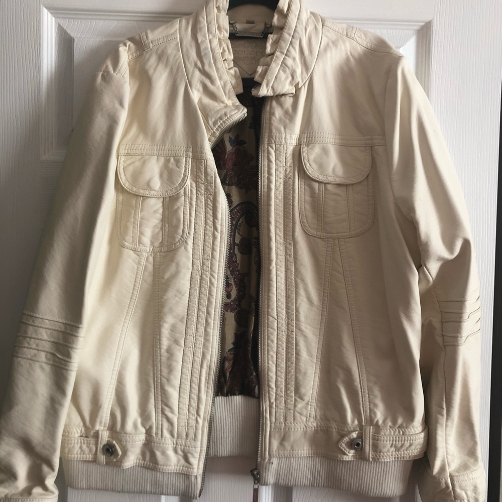 White leather like jacket.